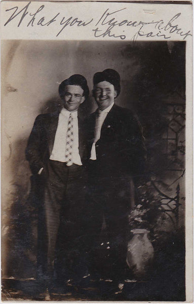 Vintage real photo postcard two men laughing in studio portrait 